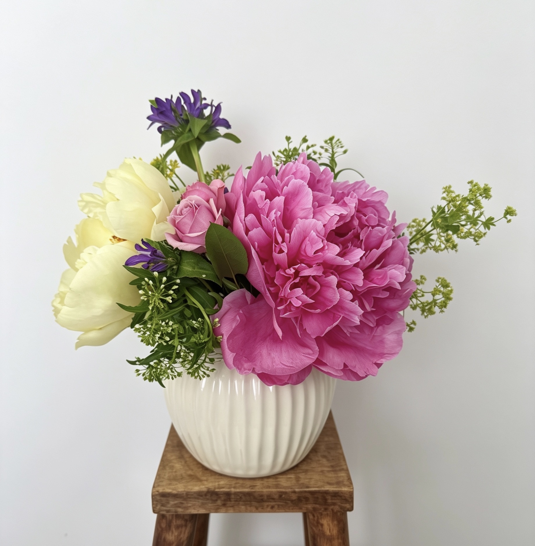 Custom garden-style bouquet with peonies and fresh greenery
